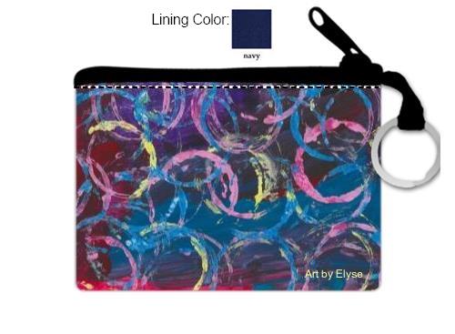 This is a coin purse with a red purple and blue background and multicolored overlapping circles
