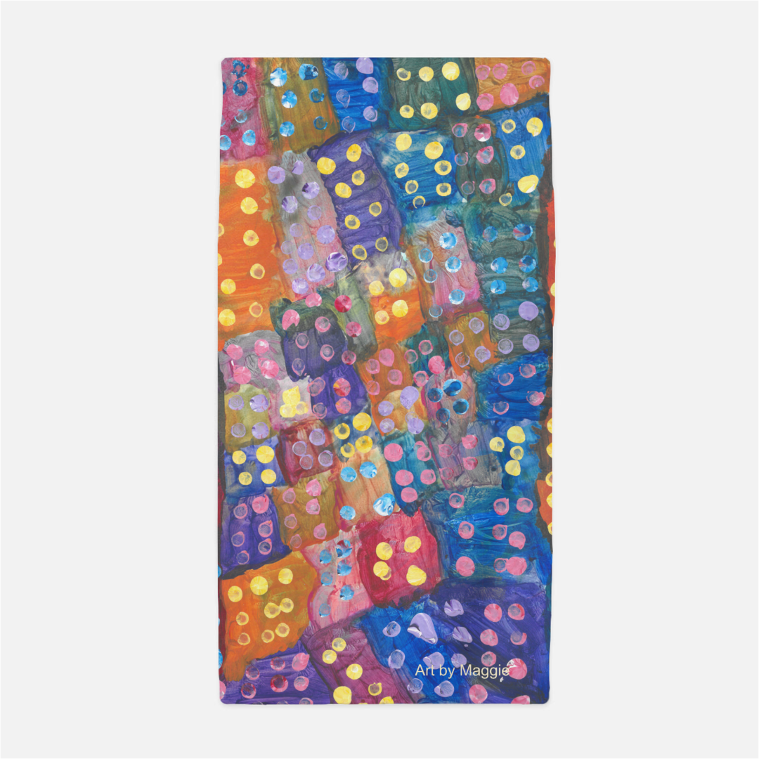 This is a beach towel with the following painting on it: This is a multicolored painting with several boxes of colors including red, orange, blue, purple and yellow. There are multicolored dots covering the page