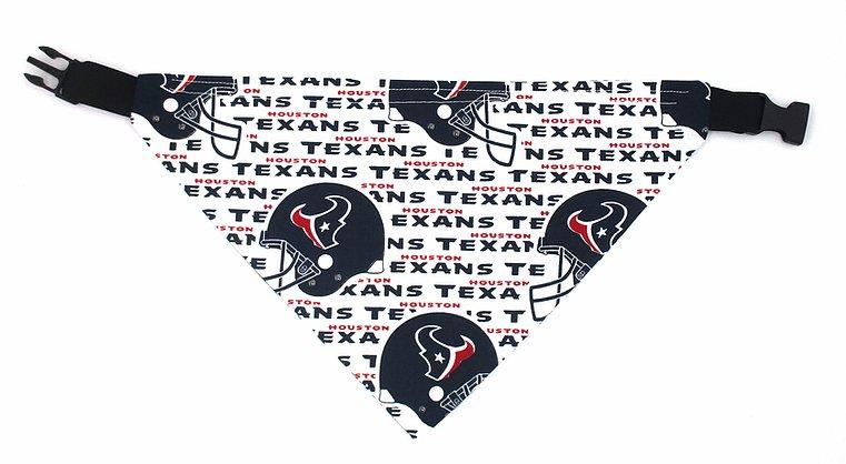 Photo of triangular dog bandana with black plastic closure.  Background of fabric is white with several Texans football helmets .  Houston Texans written in blue text.