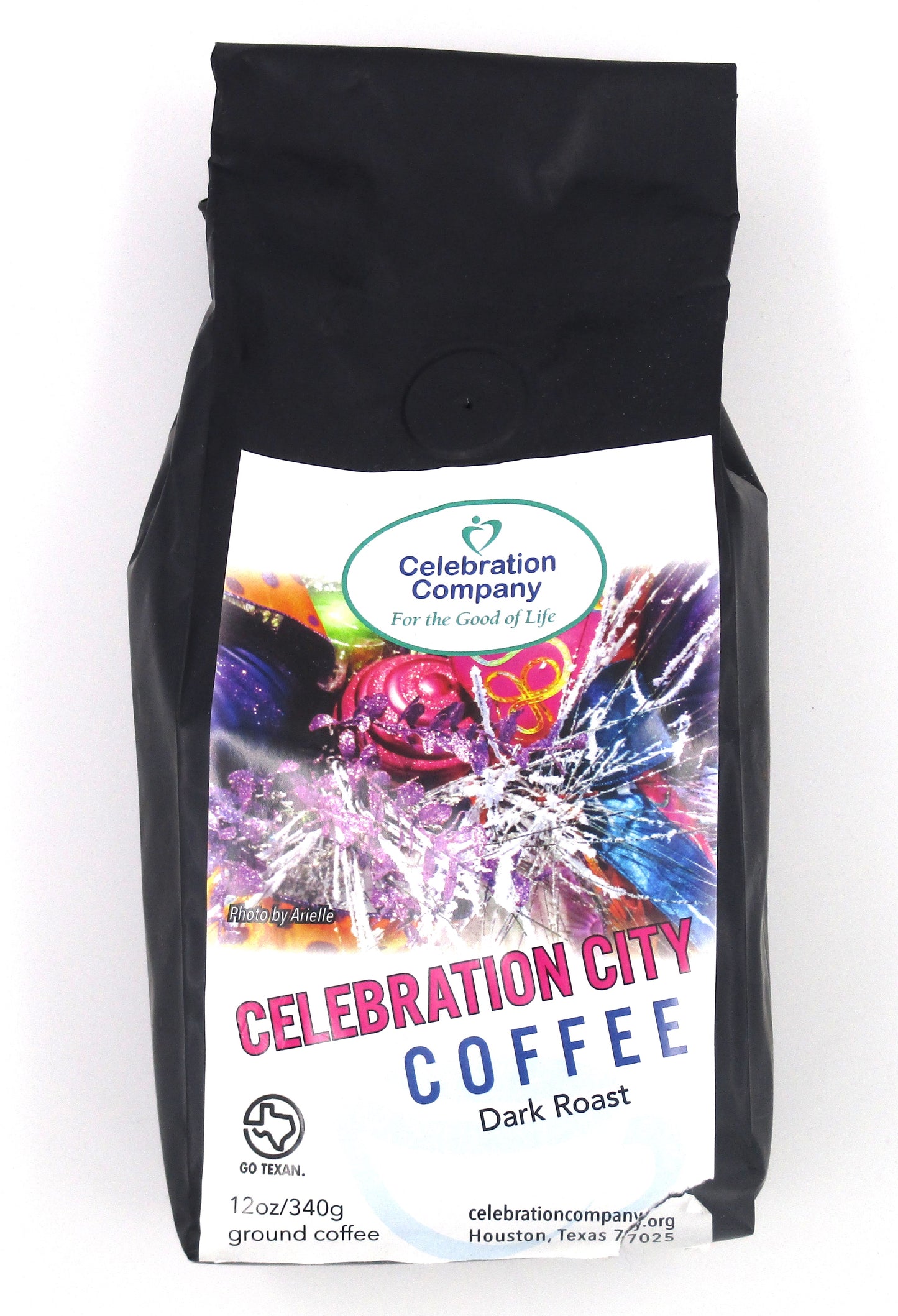 Black bag of coffee with white label for Celebration City Coffee Dark Roast