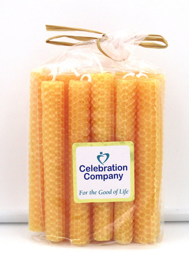 Package of 16 orange Shabbat candles in clear package with top tied off.