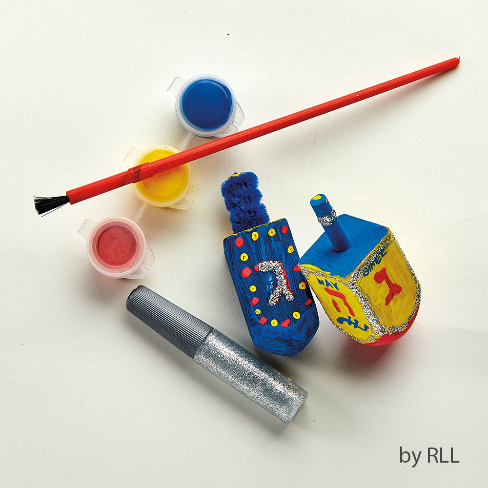 Design a Dreidel craft kit including dreidels, paint, paintbrush, glitter glue and pipe cleaners
