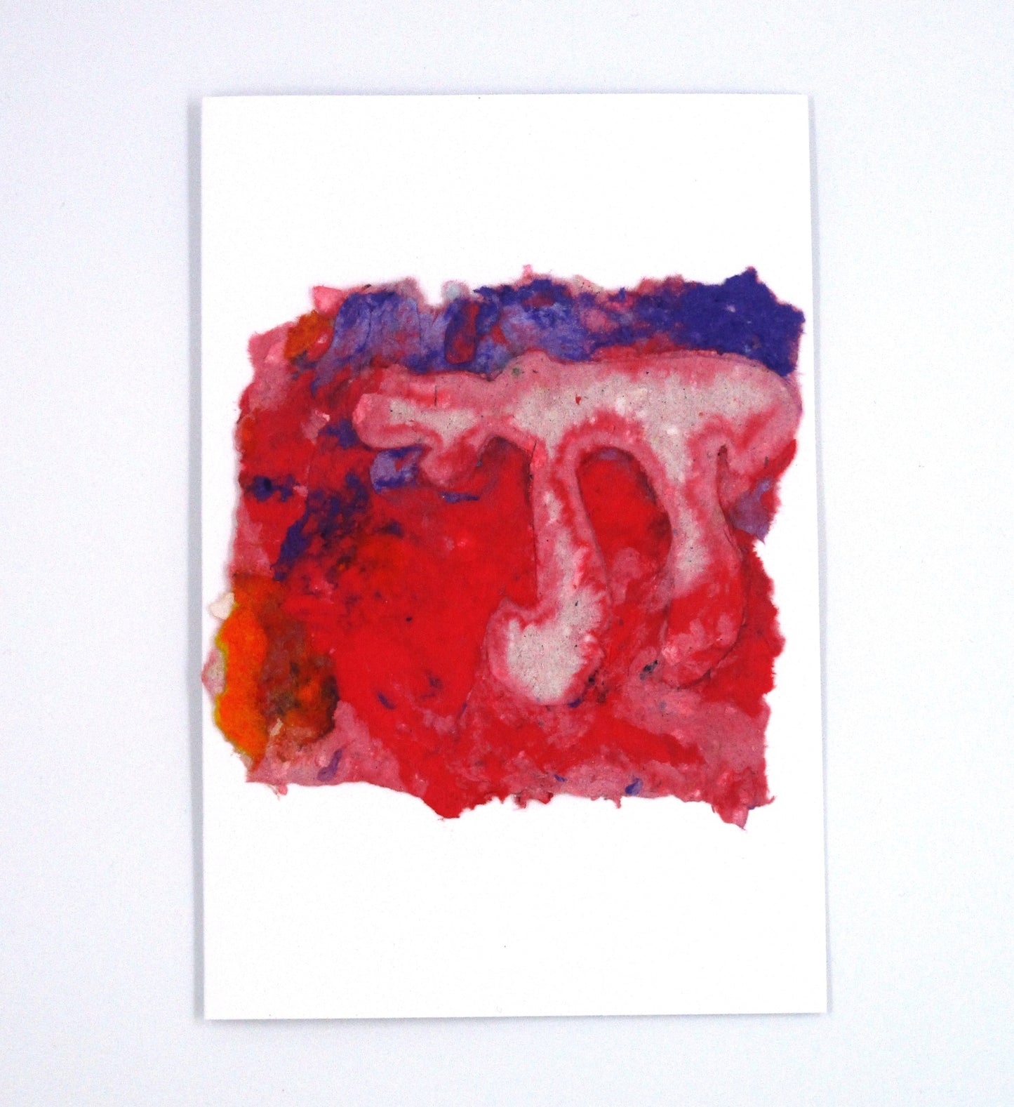 Handmade paper greeting card with white Chai against purple and red background