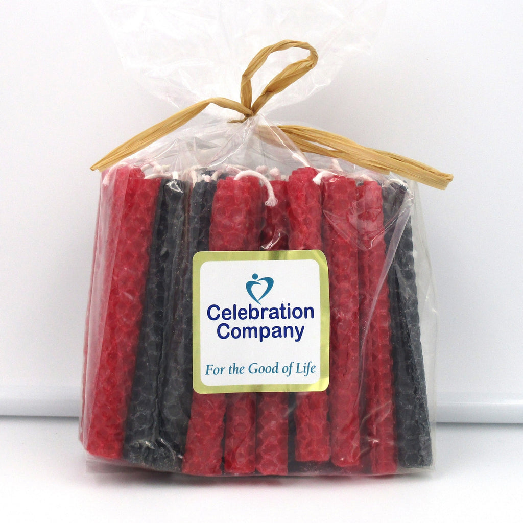 Package of 44 Chanukah candles in red and black.  The package is tied with raffia on top and has a white logo sticker on the front.