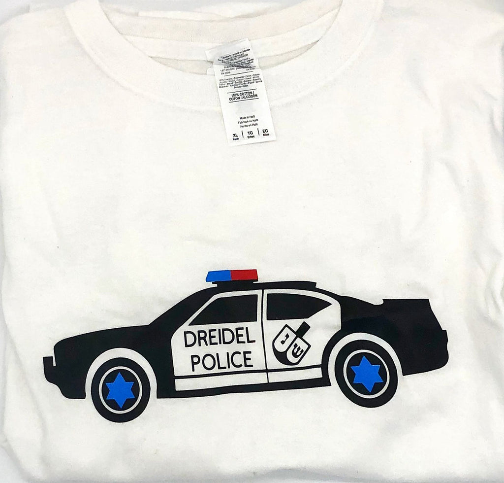White tshirt with black and white police car with a black dreidel and Dreidel Police on the door