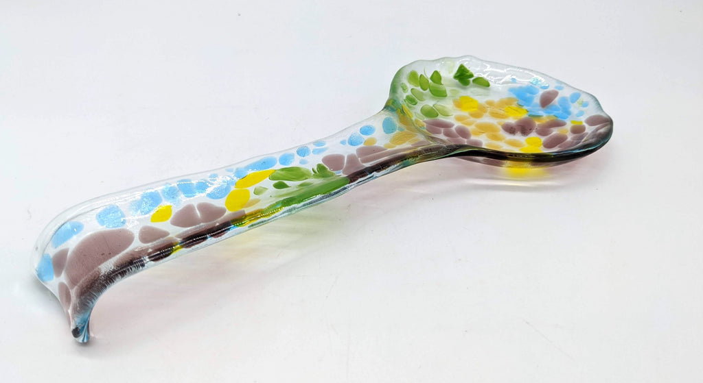 glass spoon rest with bright colors on top