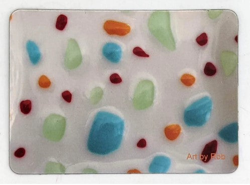 This is a magnet with the glass art imaged on it - it is white wit blue, green, red and orange splotches