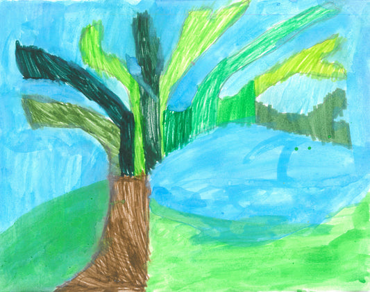 This is a picture of a tree with multicolored green branches. It is against a green hill and blue sky.