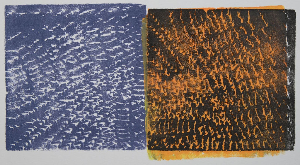 Ink on paper print with large indigo block with small white marks on the left and large black block with orange marks on the right