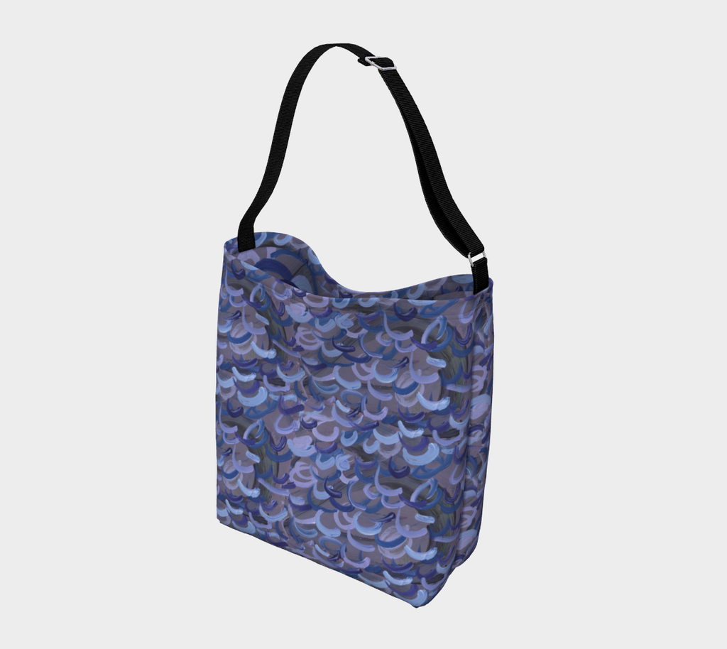 Gray Crossbody bag with black shoulder strap imprinted with original artwork of  light blue, dark blue, and lavender swirls.