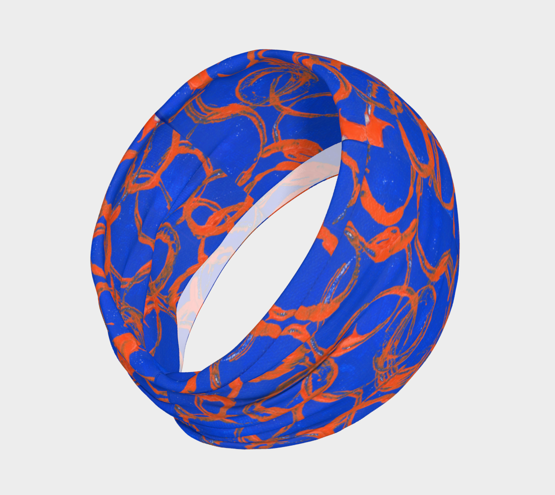 Royal blue headband with orange overlapping rings of various sizes