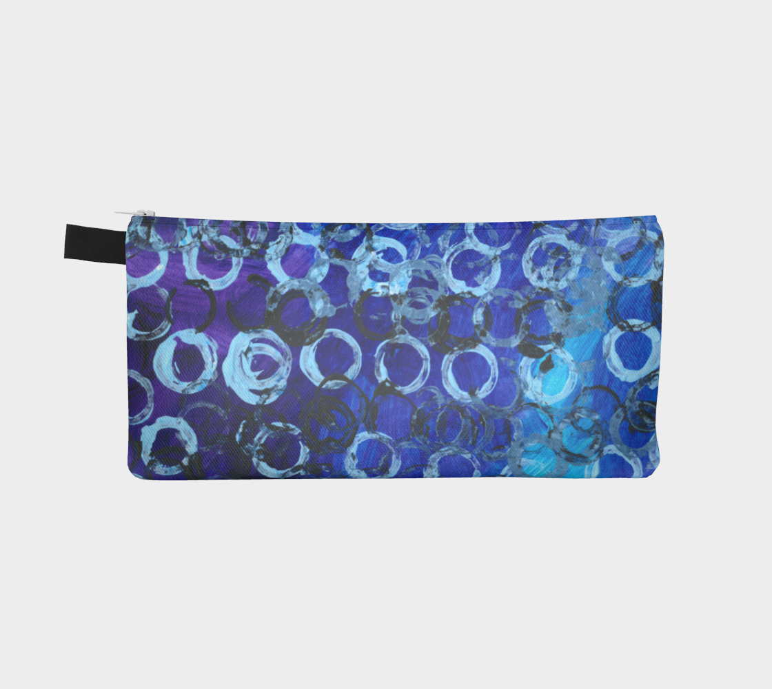 Pencil case with a gradient of purple to blue with light and dark blue rings printed on top all over