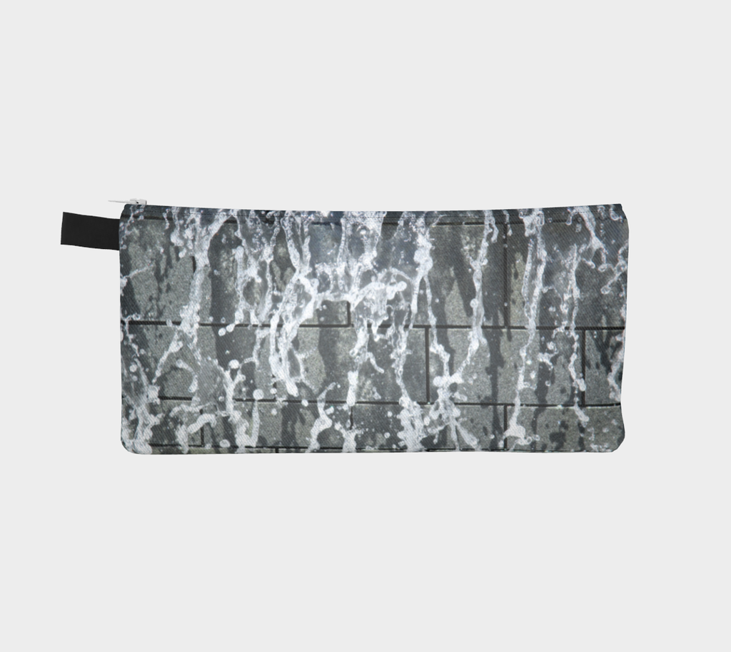 Zippered pencil case with gray, white and black design depicting running water
