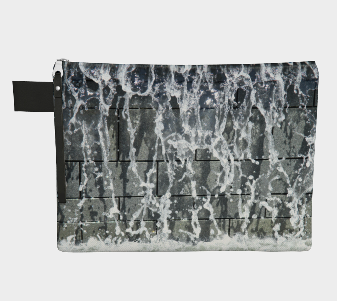 Zippered carryall with gray, white and black design depicting running water design