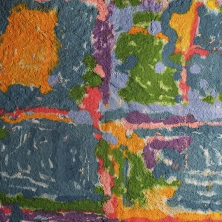 Highly textured handmade paper. Left side is mostly teal withe an orange square in the upper corner. The right half of the paper has a series of areas that are broken up by lines and dots of orange, green, purple, and pink.