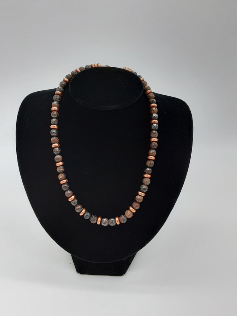 Necklace of semi precious brown stones and copper plastic disk beads