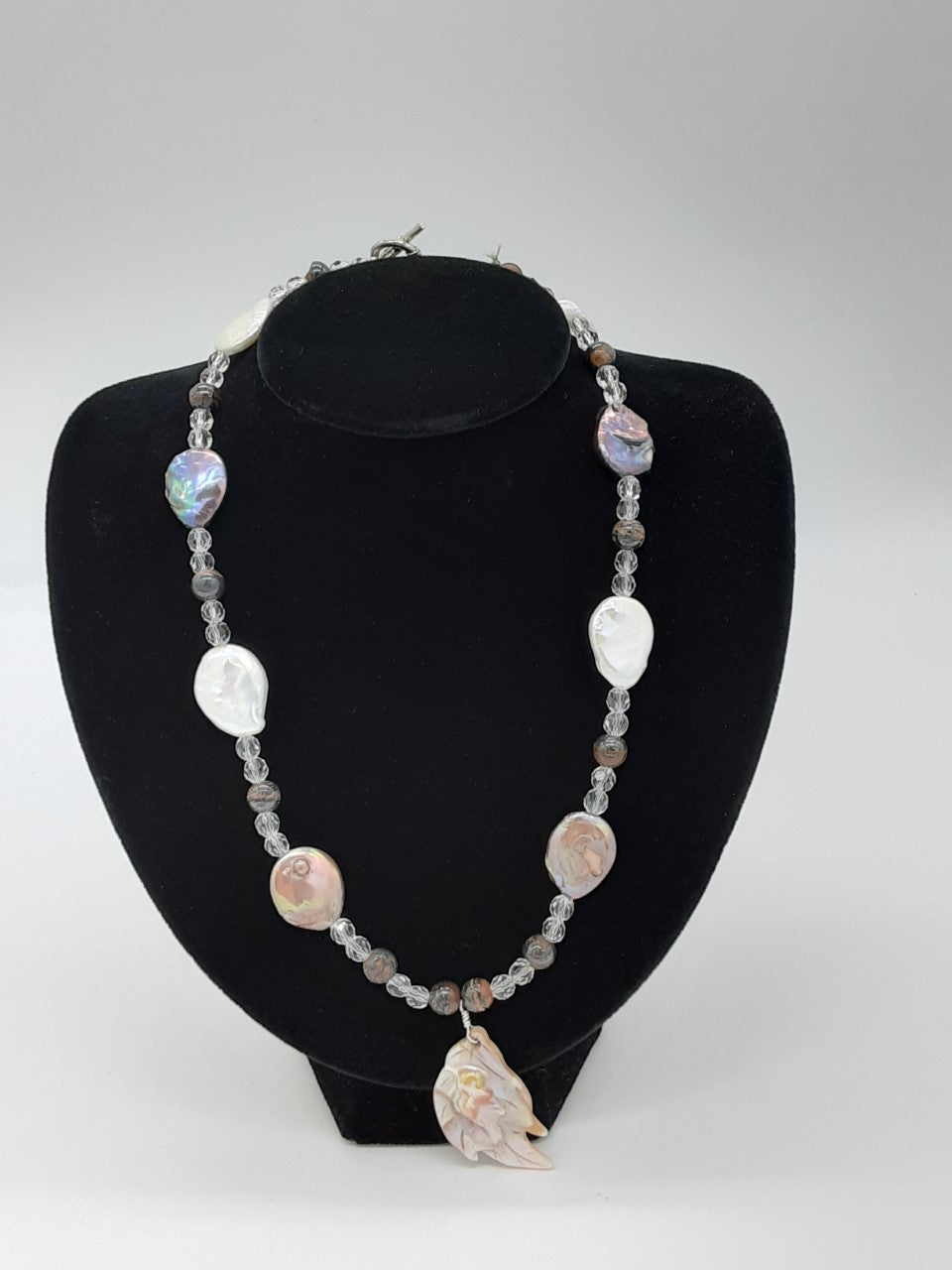 Necklace with irregular shaped pearls  and clear beads in between