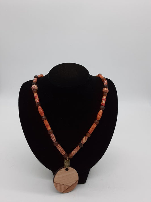 wooden beaded necklace with pendant of wood burning