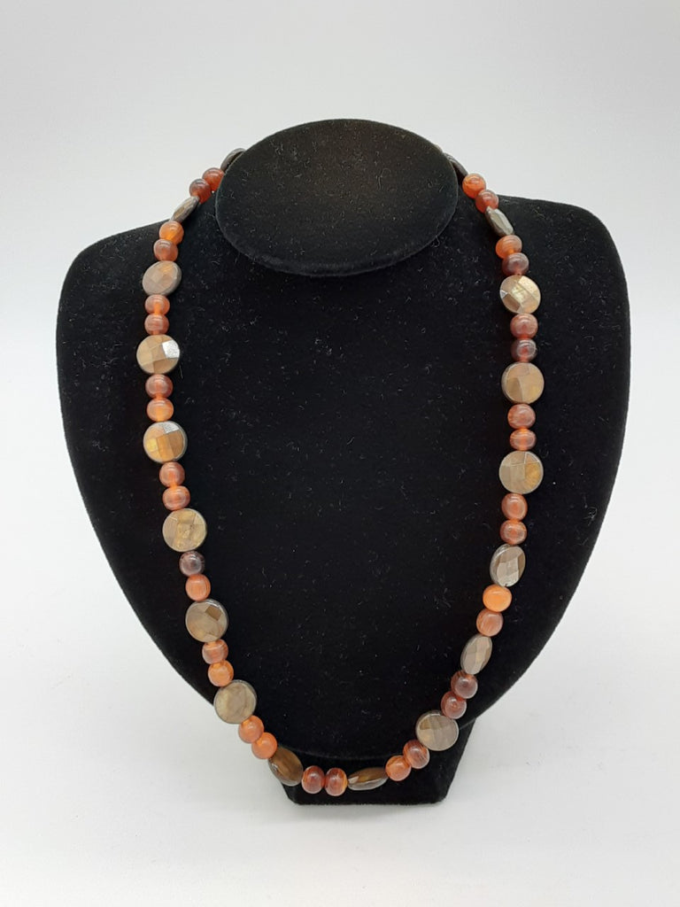 brown necklace with flat faceted circles