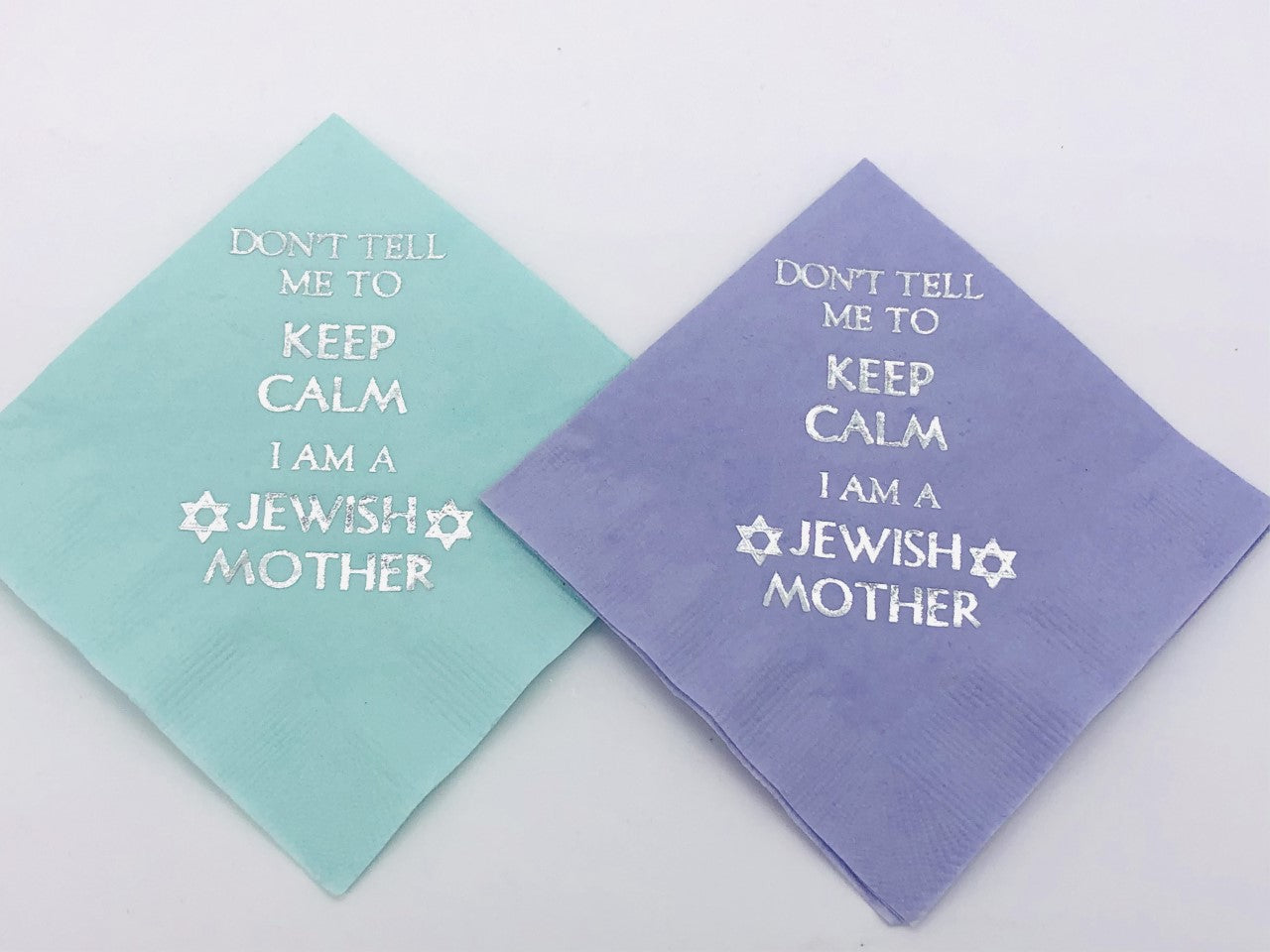 Seafoam and lavender cocktail napkins with silver Don't Tell Me To Keep Calm I am a Jewish Mother slogan