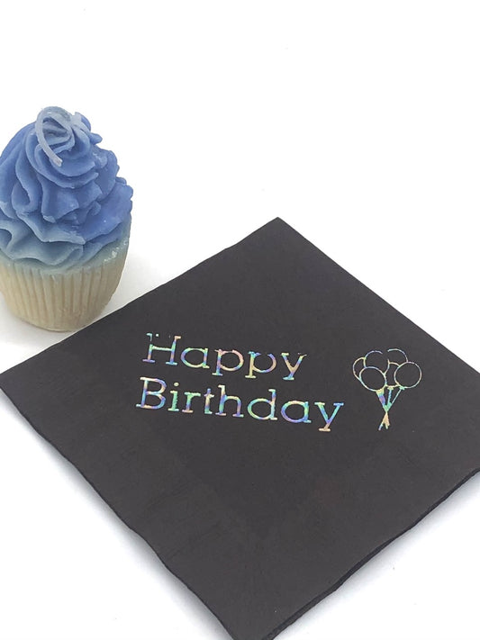 Black cocktail napkins with iridescent Happy Birthday slogan and balloon graphic