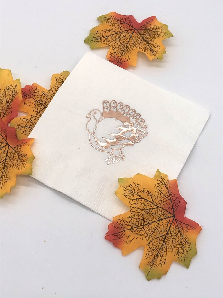 White cocktail napkin with copper foil turkey graphic