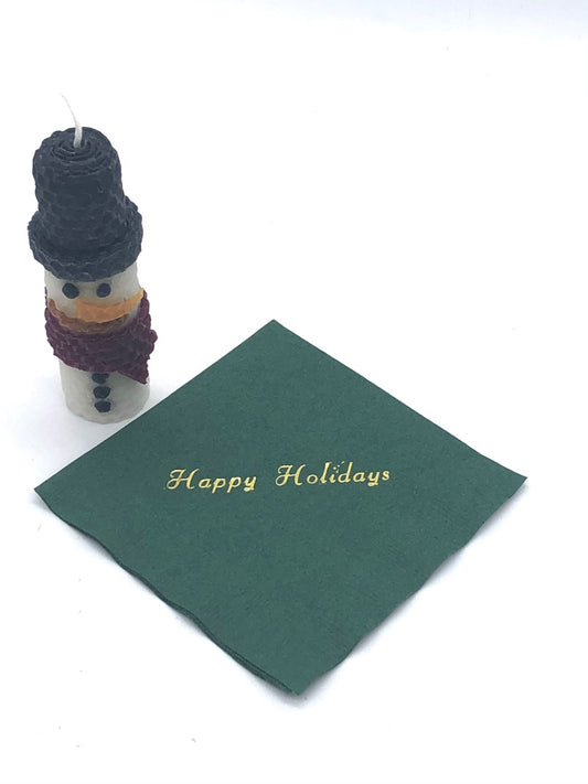 Green cocktail napkins with gold Happy Holidays slogan