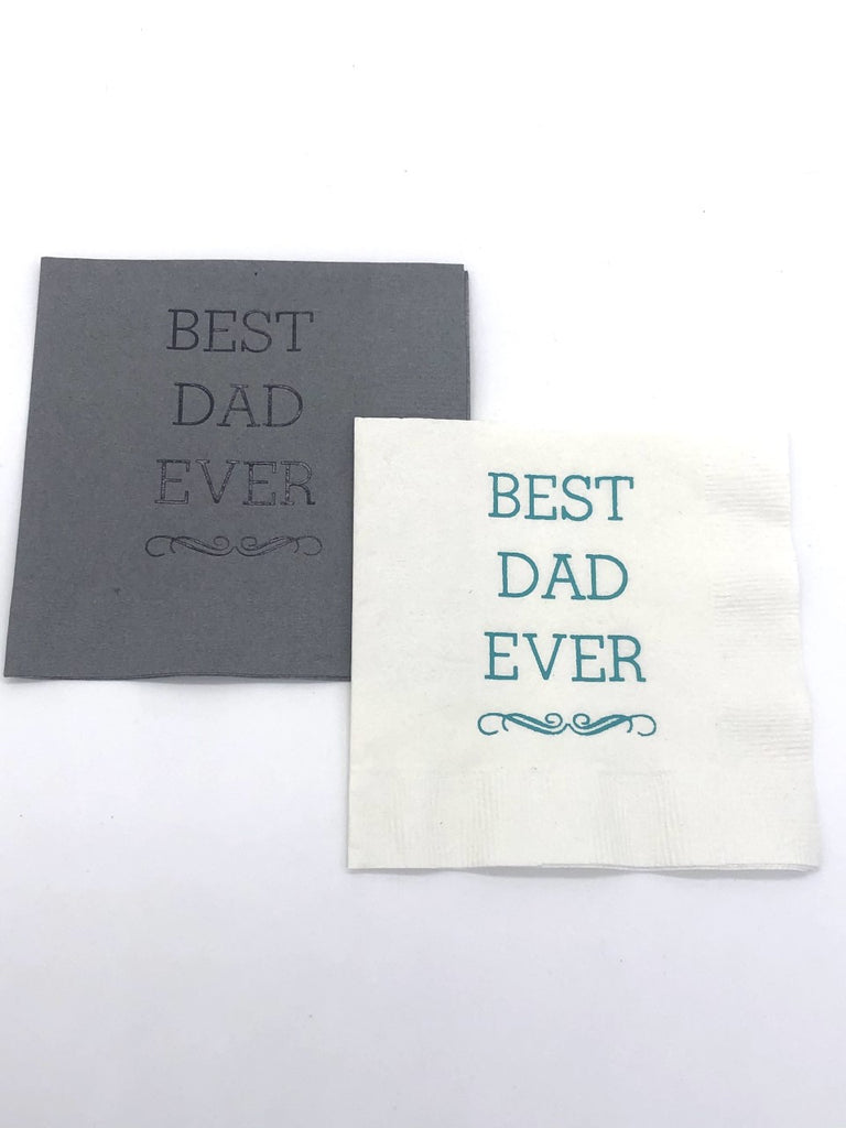 Gray cocktail napkins with black Best Dad Ever slogan and white cocktail napkins with blue Best Dad Ever slogan
