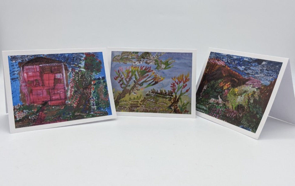picture of three greeting cards of artwork by neville