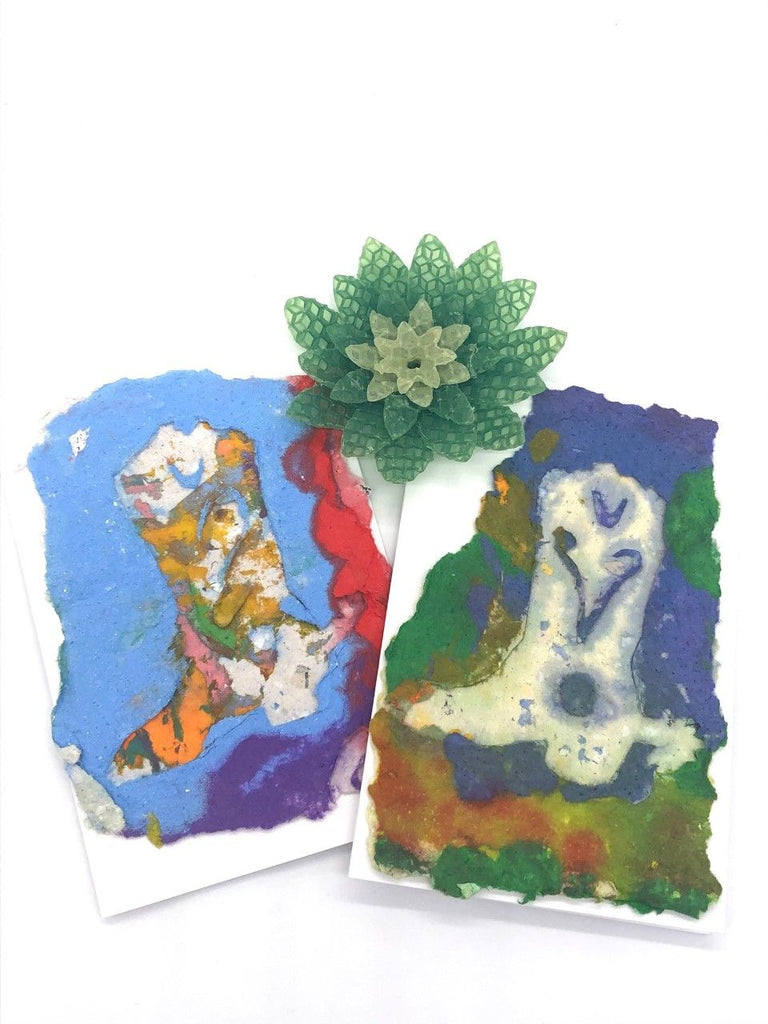 two cards with images of cowboy boots made with handmade paper in vibrant colors